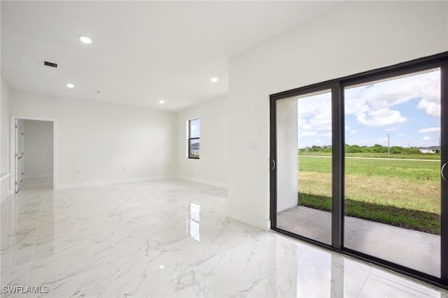 7007 Ramrod Cir, Labelle, FL 33935 - spare room with recessed lighting and light marble finish floors
