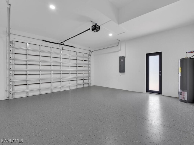 1304 Williams Ave, Lehigh Acres, FL 33972 - garage featuring water heater, a garage door opener, electric panel, and recessed lighting