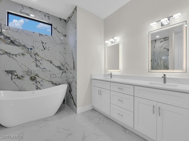 1304 Williams Ave, Lehigh Acres, FL 33972 - full bathroom with marble finish floors, double vanity, a freestanding bath, and a marble finish shower