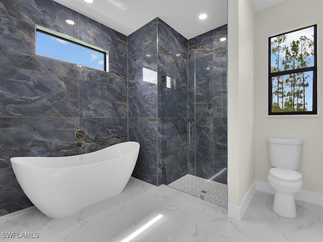 1304 Williams Ave, Lehigh Acres, FL 33972 - full bathroom with marble tiled floors, a freestanding tub, a marble finish shower, and recessed lighting