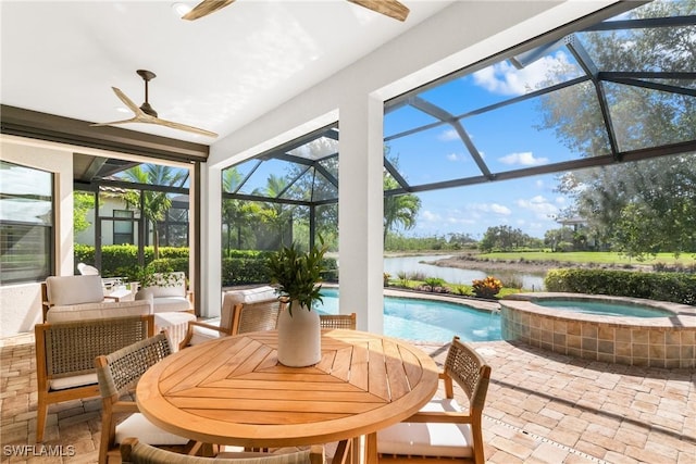 8834 Vaccaro Ct, Naples, FL 34119 - sunroom with a ceiling fan, a jacuzzi, a pool, and a water view