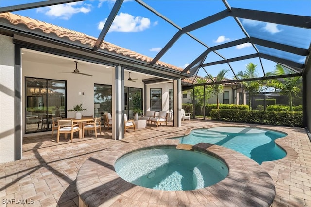 8834 Vaccaro Ct, Naples, FL 34119 - view of swimming pool with an outdoor living space, a patio area, a ceiling fan, a pool with connected hot tub, and glass enclosure