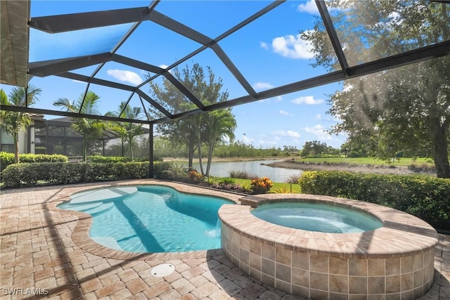 8834 Vaccaro Ct, Naples, FL 34119 - view of pool with a water view, a patio, a lanai, and a pool with connected hot tub