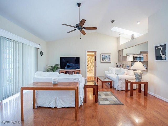 1132 Bond Ct, Marco Island, FL 34145 - living room with light wood-style flooring, lofted ceiling, and ceiling fan