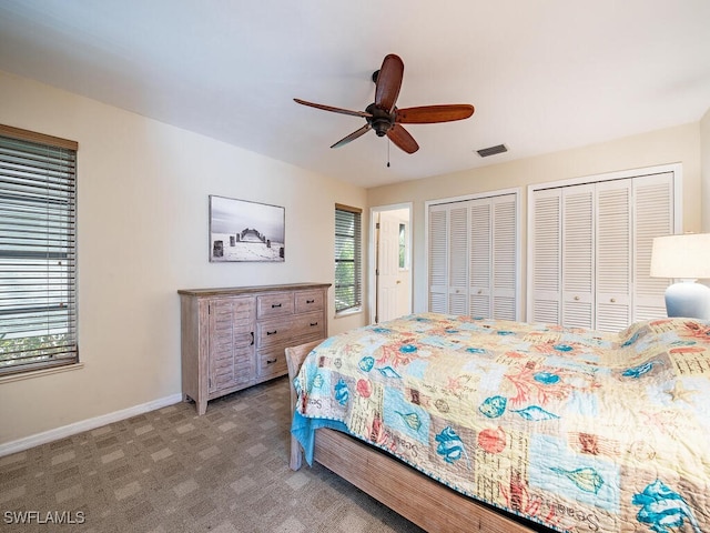 1132 Bond Ct, Marco Island, FL 34145 - bedroom featuring multiple closets, a ceiling fan, and carpet