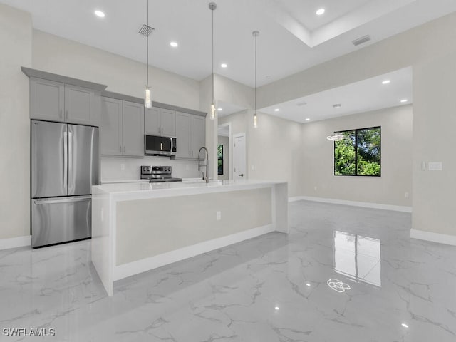 503 Lincoln Blvd, Lehigh Acres, FL 33936 - kitchen with stainless steel appliances, light marble finish flooring, recessed lighting, gray cabinetry, and light countertops
