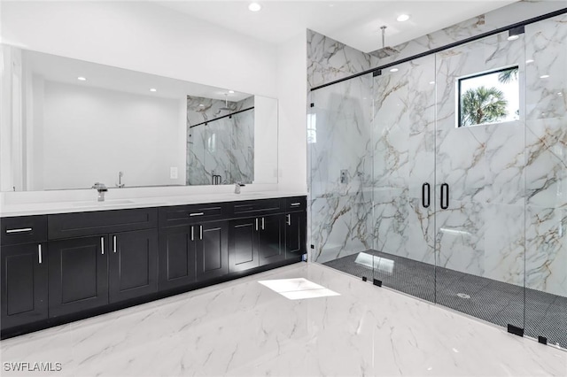 491 9th St SW, Naples, FL 34117 - full bath featuring a marble finish shower, double vanity, and recessed lighting