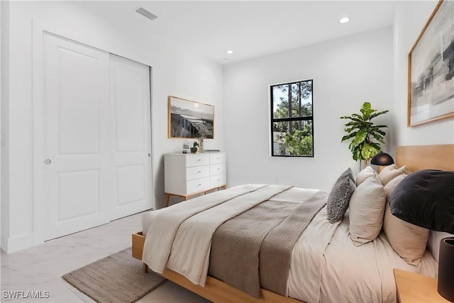 491 9th St SW, Naples, FL 34117 - bedroom featuring recessed lighting, a closet, and marble finish flooring