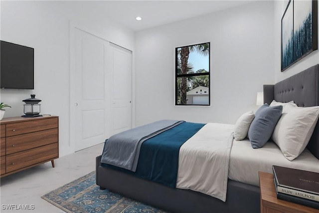 491 9th St SW, Naples, FL 34117 - bedroom with recessed lighting, a closet, and light marble finish floors