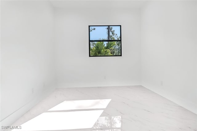 491 9th St SW, Naples, FL 34117 - unfurnished room with marble finish floors
