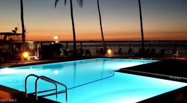 1920 Virginia Ave Unit 1102, Fort Myers, FL 33901 - pool at dusk featuring a community pool