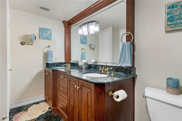1920 Virginia Ave Unit 1102, Fort Myers, FL 33901 - full bathroom featuring double vanity and toilet
