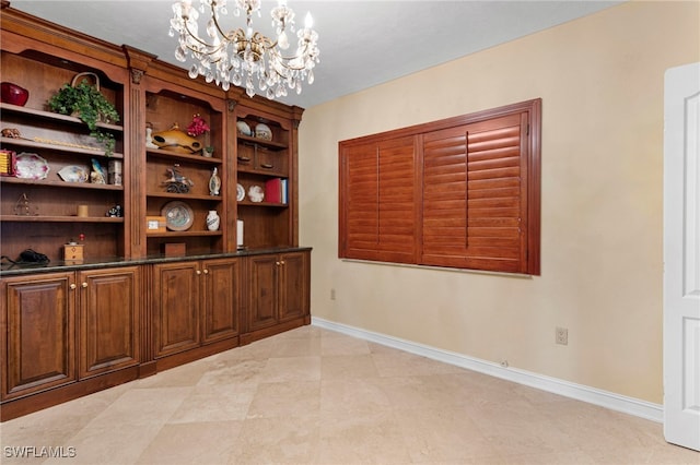 1920 Virginia Ave Unit 1102, Fort Myers, FL 33901 - dining space featuring a chandelier and baseboards