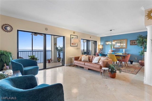1920 Virginia Ave Unit 1102, Fort Myers, FL 33901 - living room featuring a chandelier, ornamental molding, ornate columns, a water view, and tile patterned flooring