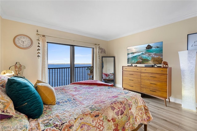 1920 Virginia Ave Unit 1102, Fort Myers, FL 33901 - bedroom with access to exterior, ornamental molding, light wood-type flooring, and a water view
