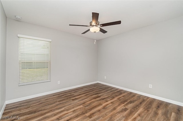 40 Ponoka St, Port Charlotte, FL 33954 - empty room featuring wood finished floors, a smoke detector, and ceiling fan