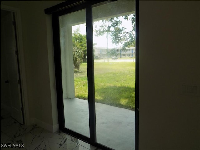 2924 Dunbar Ave, Fort Myers, FL 33916 - doorway with healthy amount of natural light and light marble finish floors