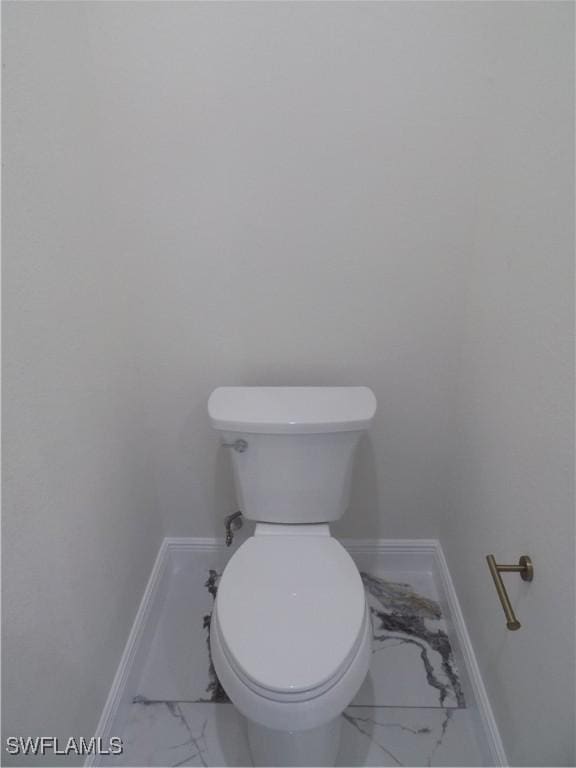 2924 Dunbar Ave, Fort Myers, FL 33916 - bathroom featuring marble finish floors and baseboards