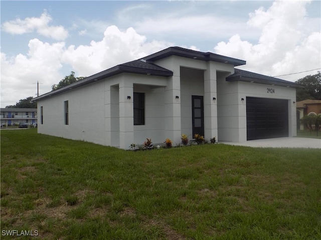 2924 Dunbar Ave, Fort Myers, FL 33916 - view of front of property with a garage, a front yard, and stucco siding