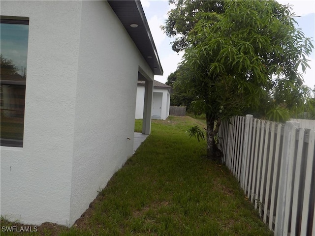 2924 Dunbar Ave, Fort Myers, FL 33916 - view of side of property featuring stucco siding