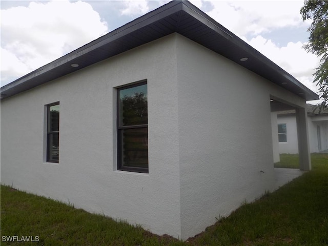 2924 Dunbar Ave, Fort Myers, FL 33916 - view of property exterior with stucco siding