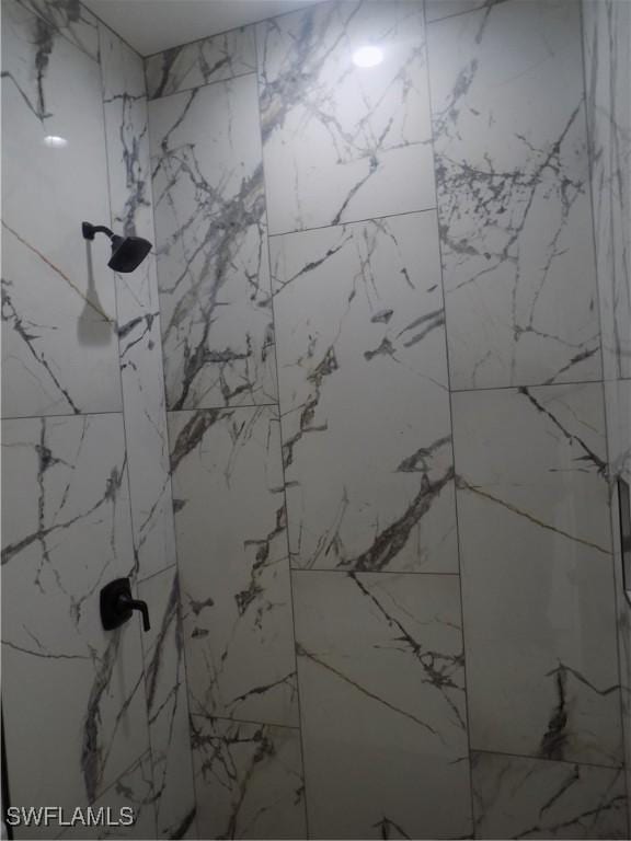 2924 Dunbar Ave, Fort Myers, FL 33916 - bathroom with a marble finish shower