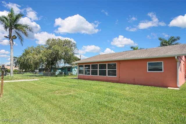 467 Stipe St, North Fort Myers, FL 33903 - back of property featuring stucco siding