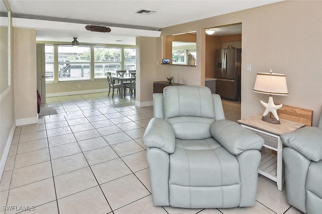 467 Stipe St, North Fort Myers, FL 33903 - living room with light tile patterned floors and baseboards