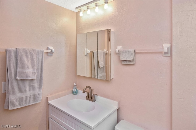 467 Stipe St, North Fort Myers, FL 33903 - bathroom featuring vanity and toilet