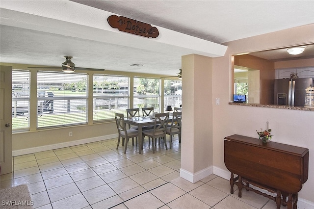467 Stipe St, North Fort Myers, FL 33903 - dining space featuring ceiling fan and light tile patterned floors