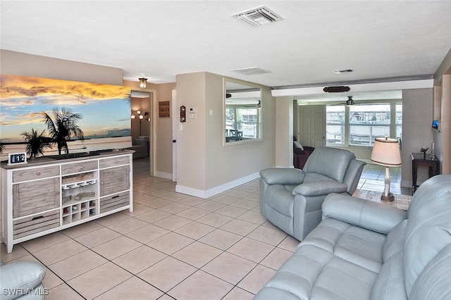 467 Stipe St, North Fort Myers, FL 33903 - living area featuring light tile patterned floors and baseboards