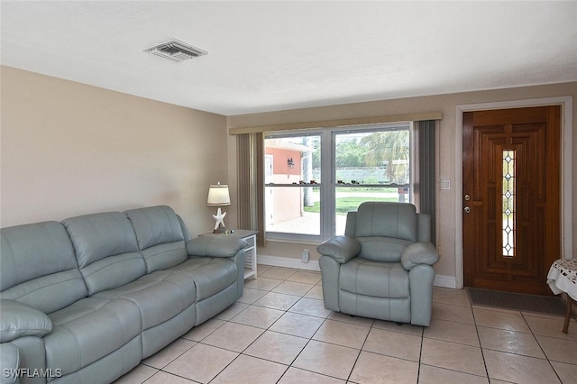 467 Stipe St, North Fort Myers, FL 33903 - living room featuring light tile patterned flooring