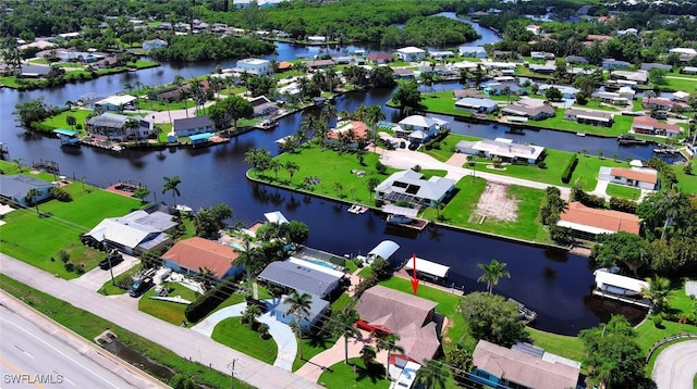 467 Stipe St, North Fort Myers, FL 33903 - aerial perspective of suburban area with a nearby body of water