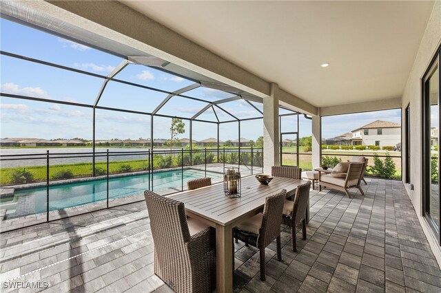 524 Burnt Store Rd S, Cape Coral, FL 33993 - view of patio featuring an outdoor pool, outdoor lounge area, and glass enclosure