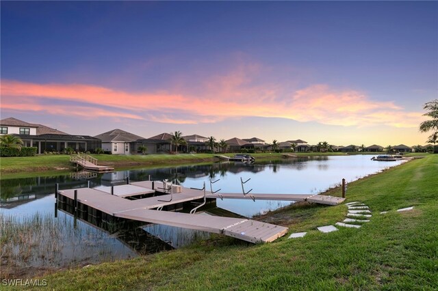 11699 Caleri Ct, Fort Myers, FL 33913 - dock featuring a water view, a lawn, and a residential view