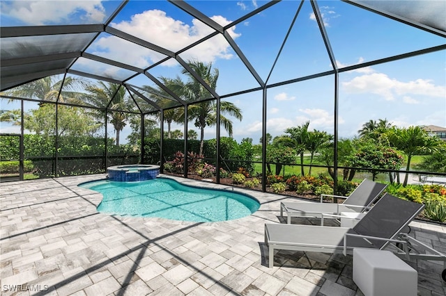 11699 Caleri Ct, Fort Myers, FL 33913 - view of swimming pool with a patio area, a pool with connected hot tub, and a lanai