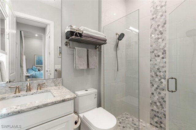 11699 Caleri Ct, Fort Myers, FL 33913 - ensuite bathroom featuring a shower stall and vanity