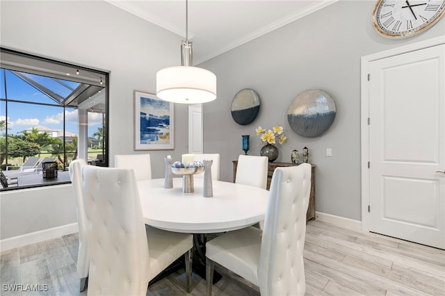 11699 Caleri Ct, Fort Myers, FL 33913 - dining area featuring ornamental molding and light wood-type flooring