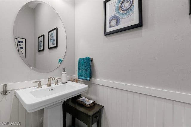 11699 Caleri Ct, Fort Myers, FL 33913 - bathroom with a wainscoted wall