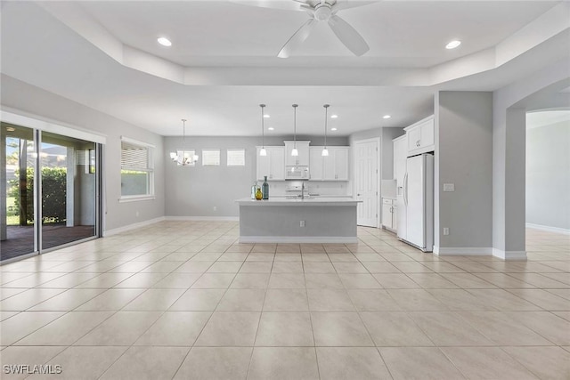 14601 Tropical Dr, Naples, FL 34114 - kitchen with white appliances, ceiling fan, a chandelier, recessed lighting, and light tile patterned floors