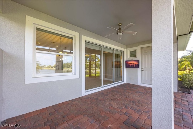 14601 Tropical Dr, Naples, FL 34114 - view of patio featuring ceiling fan