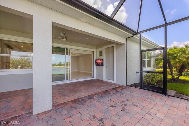 14601 Tropical Dr, Naples, FL 34114 - unfurnished sunroom with a ceiling fan