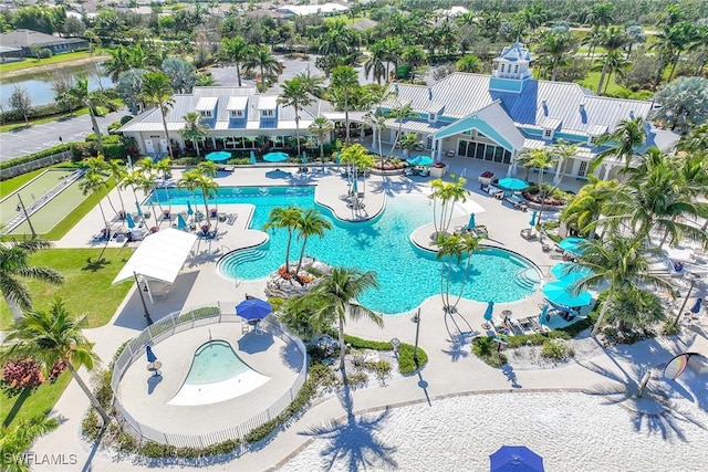 14601 Tropical Dr, Naples, FL 34114 - community pool featuring a patio