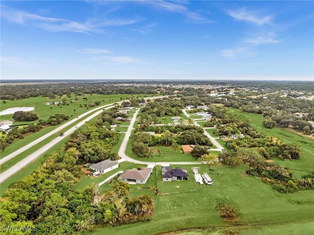 6027 Acorn Cir, Labelle, FL 33935 - aerial overview of property's location featuring a tree filled landscape