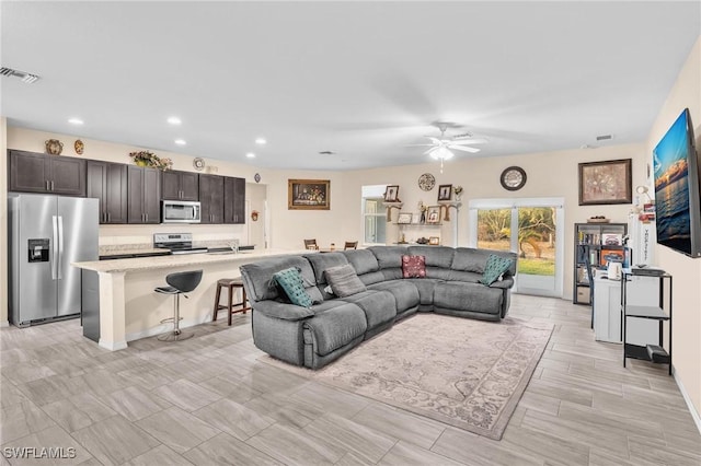 6027 Acorn Cir, Labelle, FL 33935 - living area featuring a ceiling fan and recessed lighting