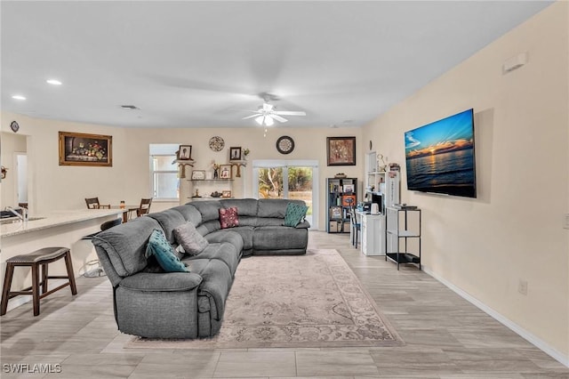 6027 Acorn Cir, Labelle, FL 33935 - living room featuring ceiling fan and recessed lighting