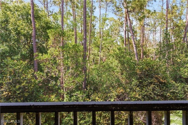 26425 Lucky Stone Rd Unit 201, Bonita Springs, FL 34135 - view of yard with a wooded view