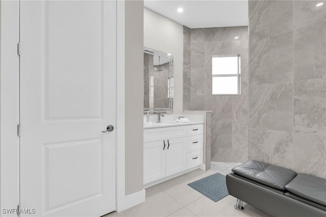 1806 41st St SW, Naples, FL 34116 - full bathroom featuring vanity, tile walls, a shower, and tile patterned floors