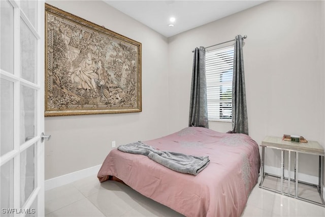 1806 41st St SW, Naples, FL 34116 - tiled bedroom featuring baseboards and recessed lighting