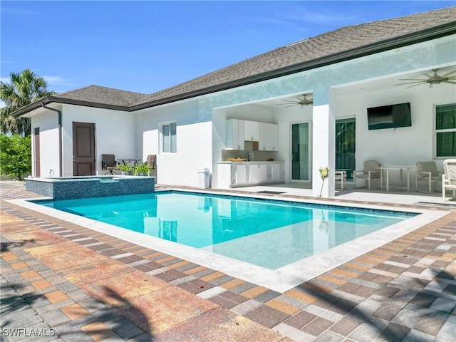 1806 41st St SW, Naples, FL 34116 - view of swimming pool featuring an outdoor kitchen, ceiling fan, and a patio area